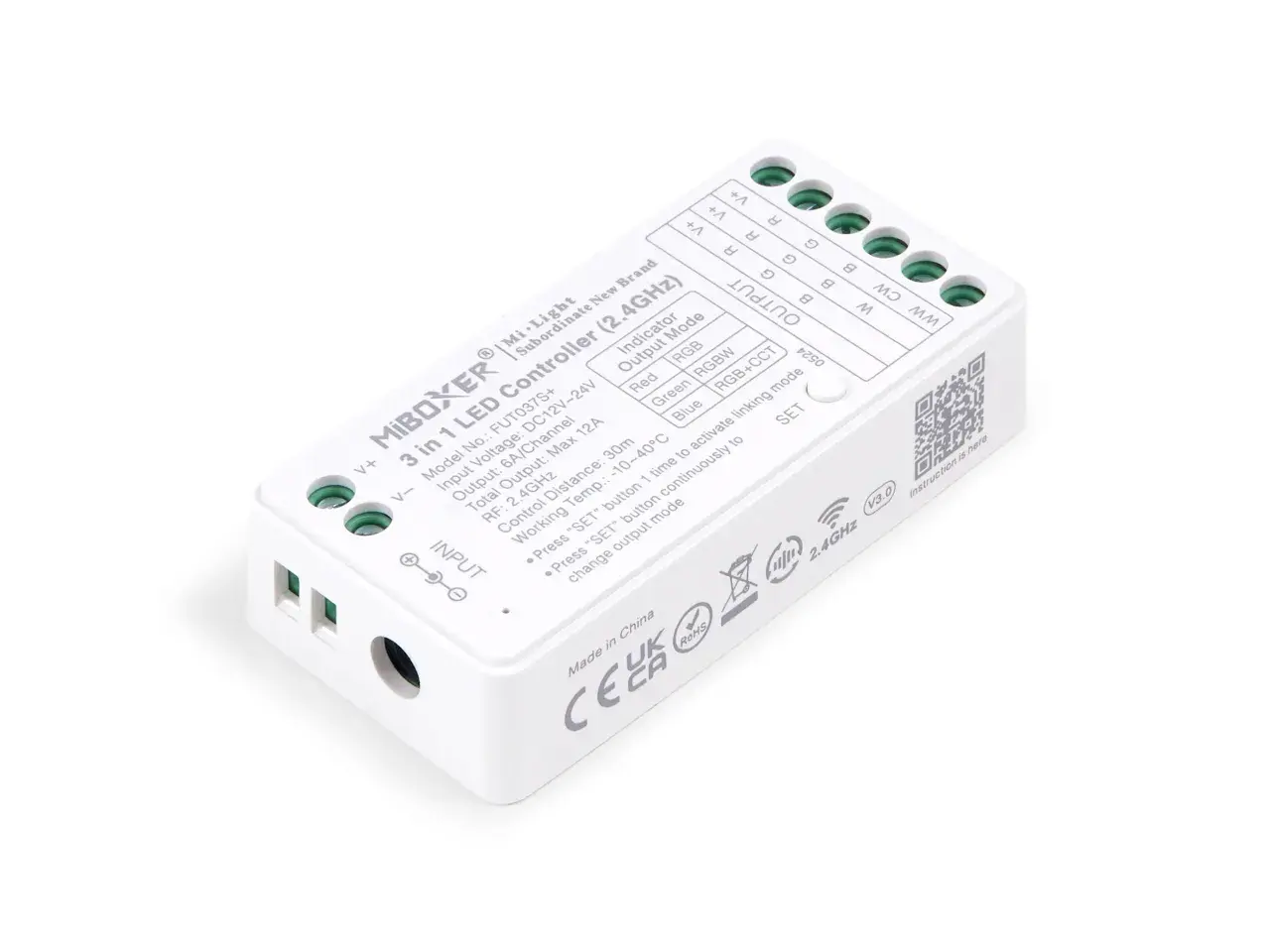 Biały kontroler MiBoxer do sterowania oświetleniem RGB, RGBW i RGB+CCT. Urządzenie posiada złącza wejściowe i wyjściowe oraz przycisk SET.
